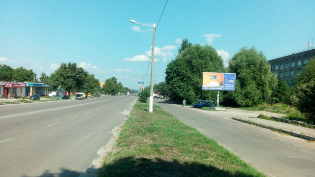 Щит 6x3, Коростишів в. Більшовицька 129,центральна вулиця, напрямок з Житомира на Київ, ст А Щит 6x3, Коростишів в. Більшовицька 129,центральна вулиця, напрямок з Житомира на Київ, ст А